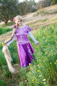 Rapunzel in the meadow at an Orange County photo shoot